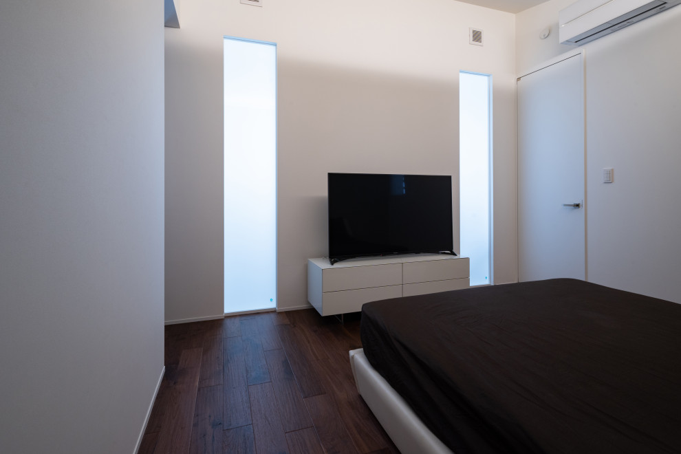 他の地域にあるおしゃれな寝室のレイアウト