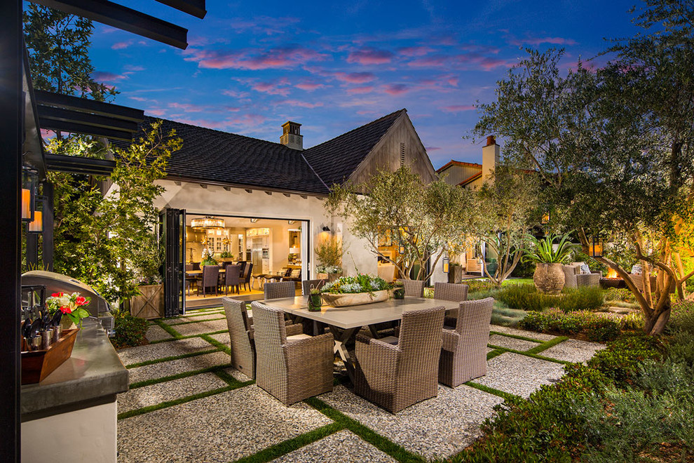 Inspiration for a traditional backyard patio in Orange County with an outdoor kitchen and no cover.