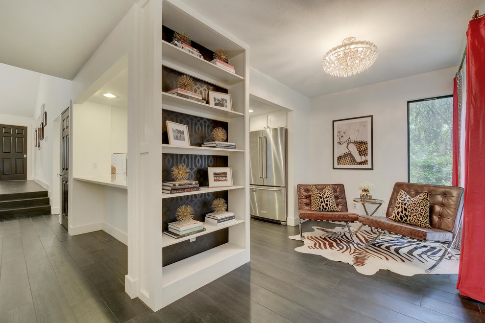 Inspiration for a transitional dining room remodel in Austin with white walls