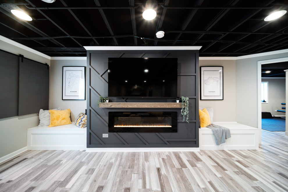 Example of a trendy vinyl floor, beige floor and exposed beam basement design in Chicago with beige walls