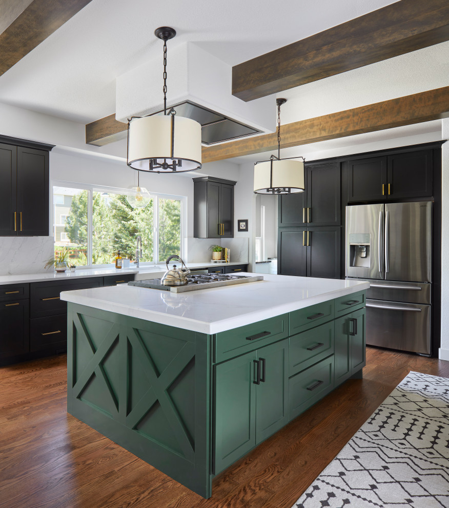 Transitional exposed beam kitchen photo in Denver with an island