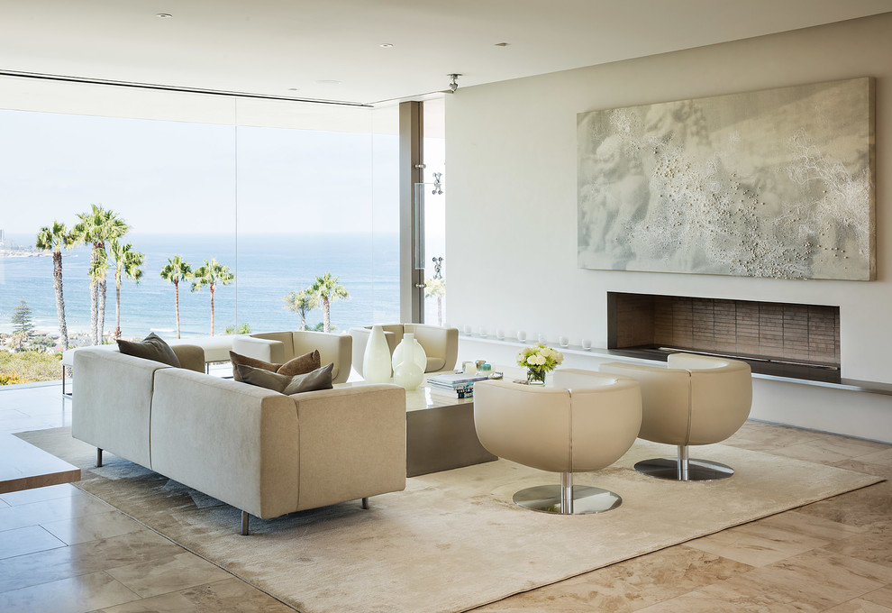 This is an example of a contemporary living room in San Diego with beige walls, a ribbon fireplace and no tv.
