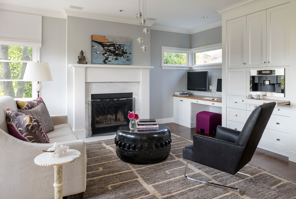 Mid-sized transitional family room in Seattle with a standard fireplace, a wall-mounted tv and grey walls.