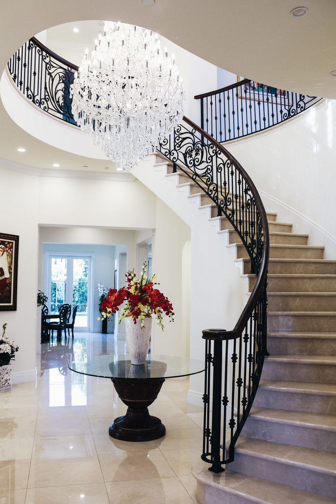 Inspiration for a timeless curved staircase remodel in Los Angeles
