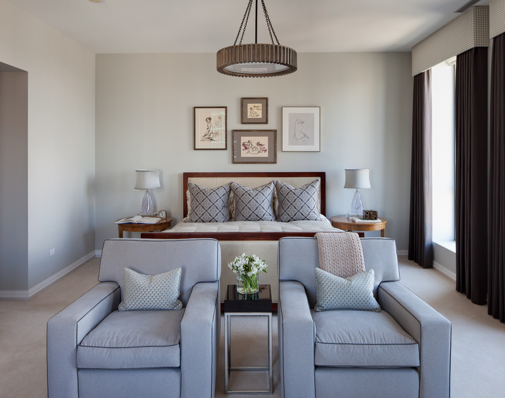Traditional bedroom in Chicago with grey walls.