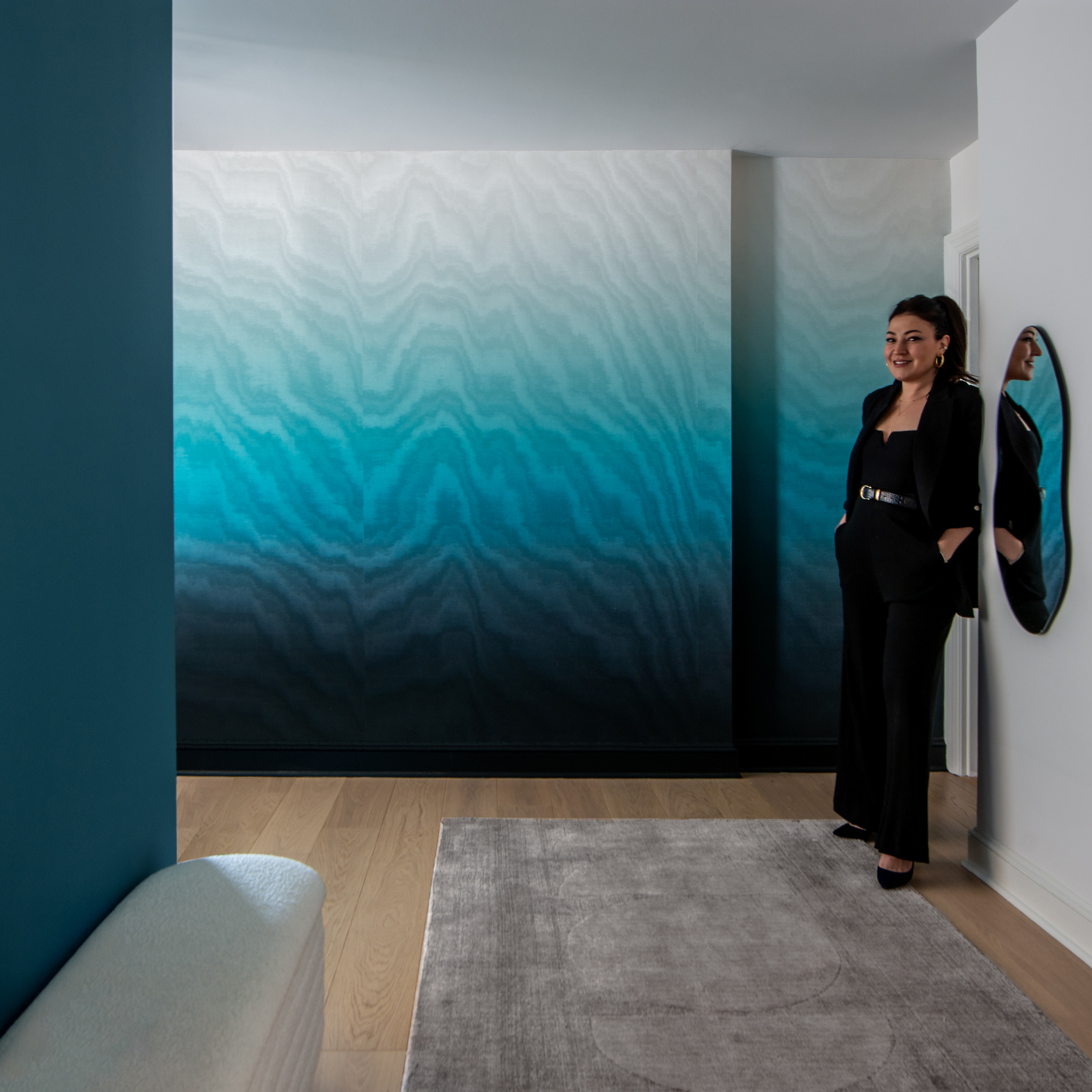 This foyer was designed for a Californian client who wanted to bring the ocean into her Manhattan pied-à-terre. The dramatic ombré wallpaper, transitioning from deep ocean blues to soft whites, perfec