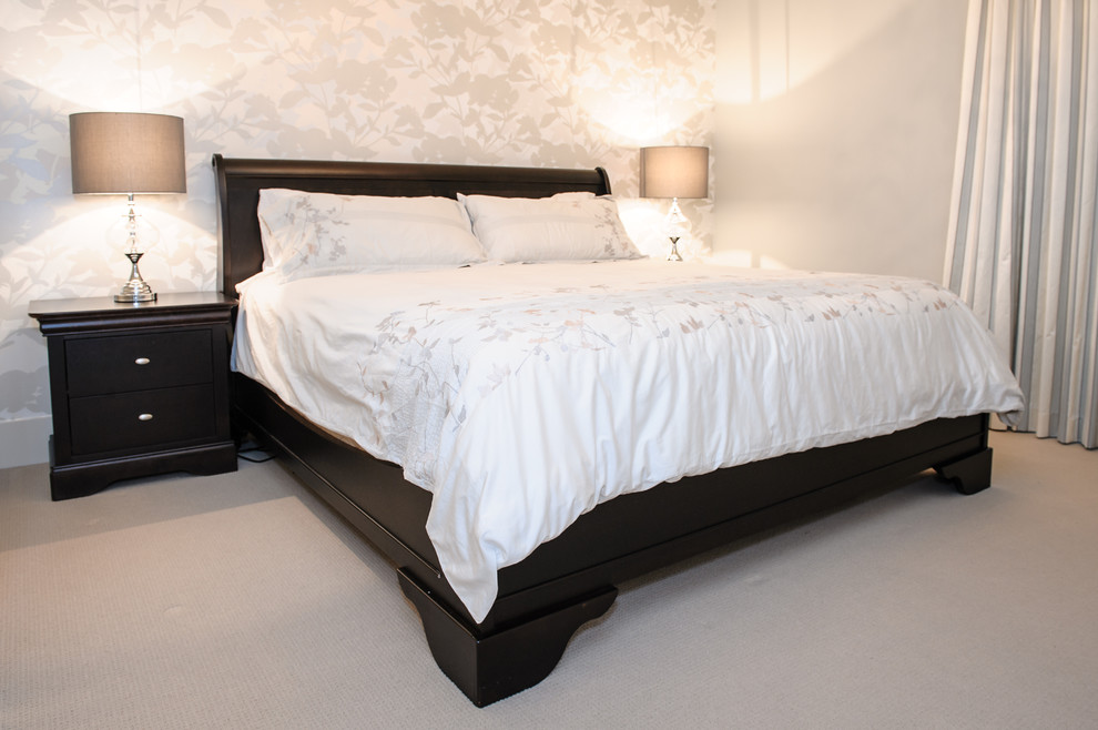 This is an example of a transitional bedroom in Vancouver.