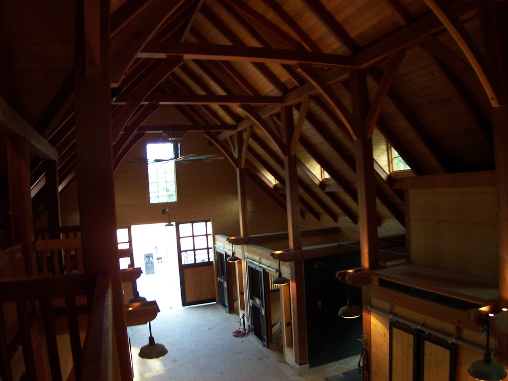 Inspiration for a rustic two-story wood brown garage remodel