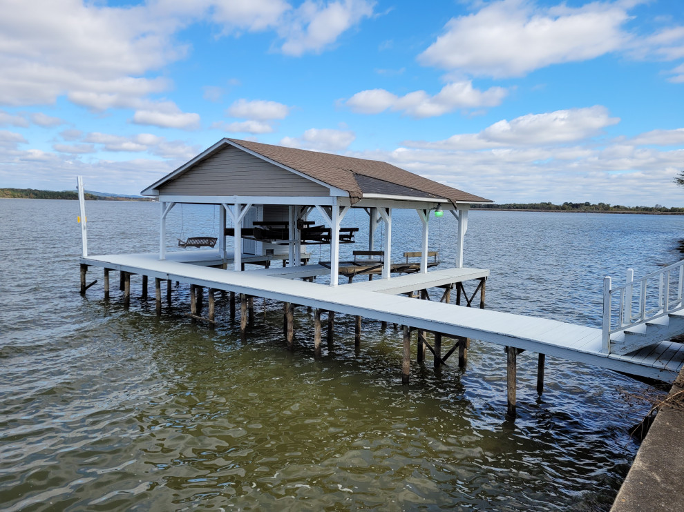 Design ideas for a beach style deck in Birmingham with with dock.