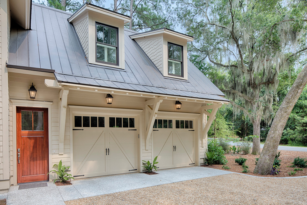 Garage workshop - mid-sized country detached two-car garage workshop idea in Grand Rapids