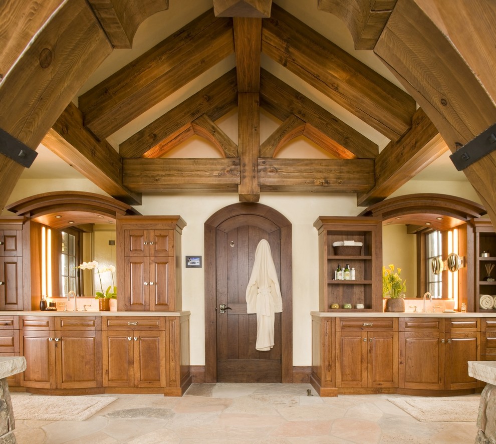 Design ideas for a country master bathroom in Denver with raised-panel cabinets, medium wood cabinets and beige walls.