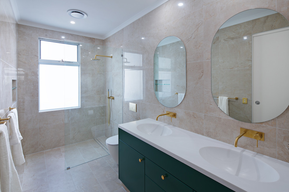 Design ideas for a contemporary bathroom in Sydney with flat-panel cabinets, green cabinets, a curbless shower, beige tile, an integrated sink, beige floor, an open shower, white benchtops, a double vanity and a floating vanity.
