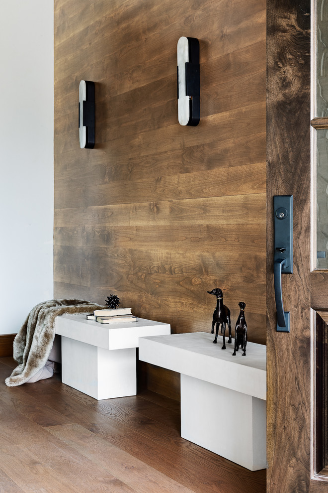 Large transitional medium tone wood floor foyer photo in Atlanta with a medium wood front door