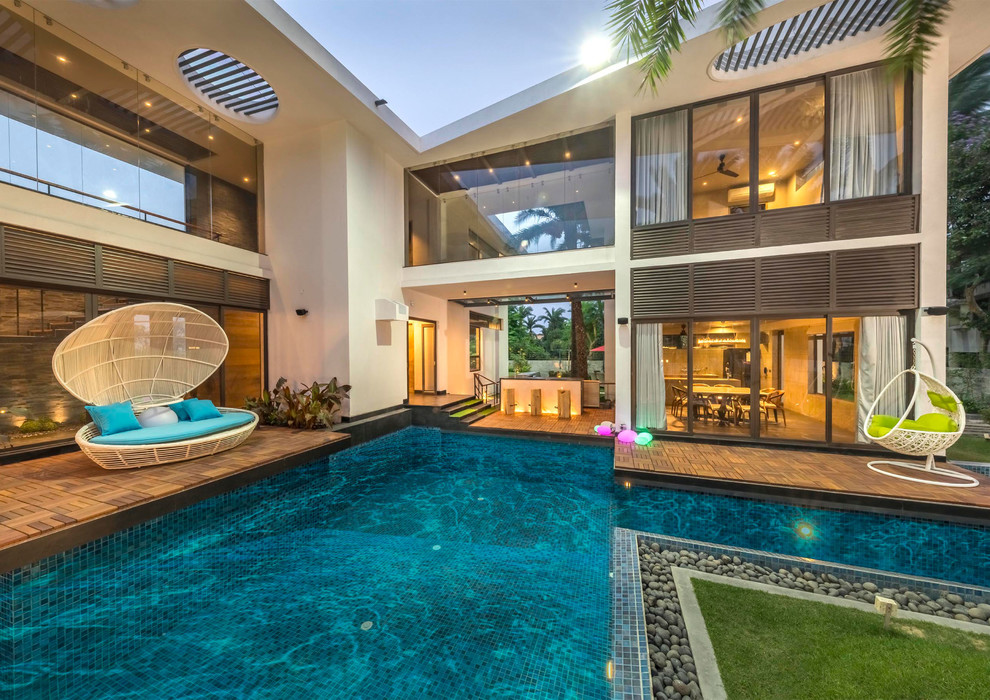 Inspiration for a contemporary swimming pool in Kolkata.