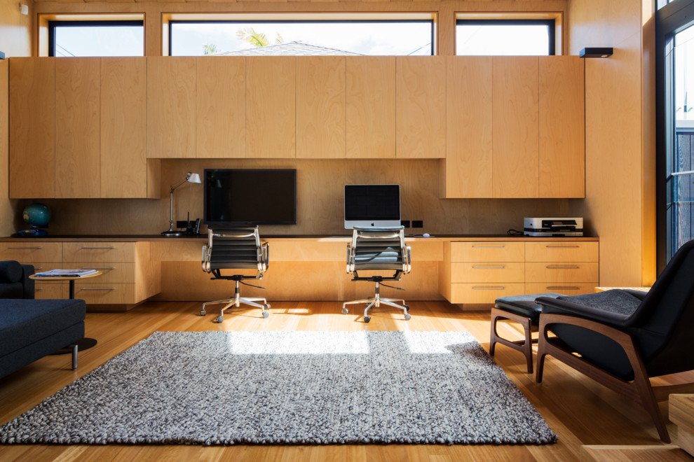 Photo of a contemporary home office in Auckland.