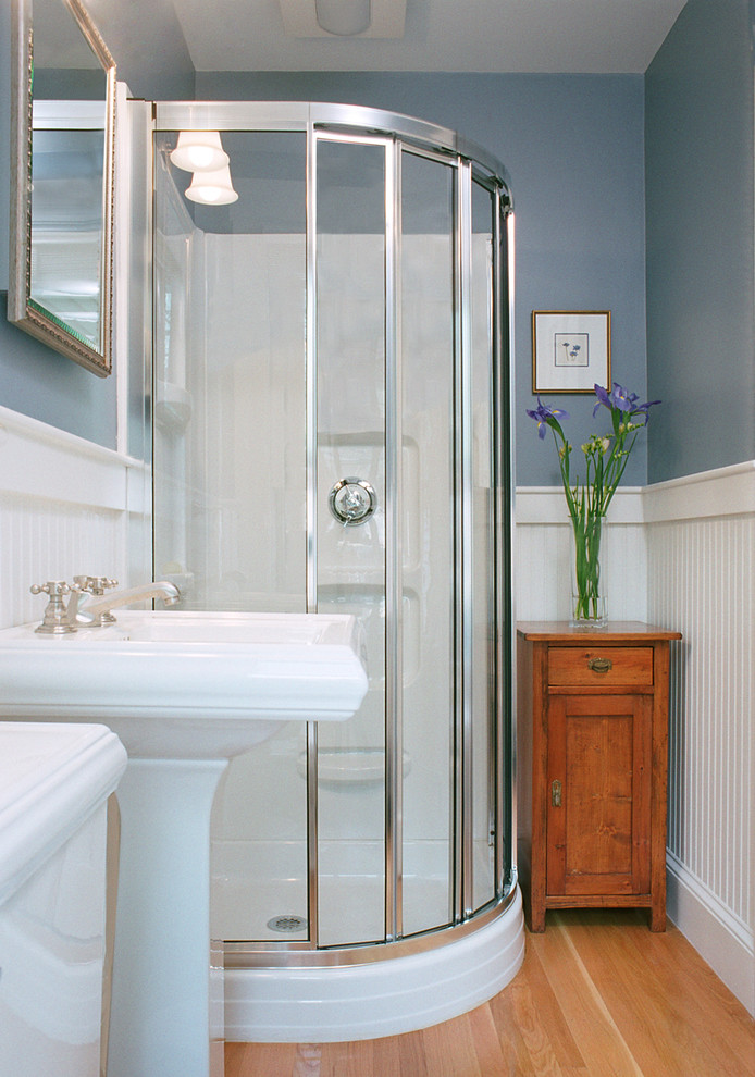 This is an example of a traditional bathroom in Boston with a pedestal sink.