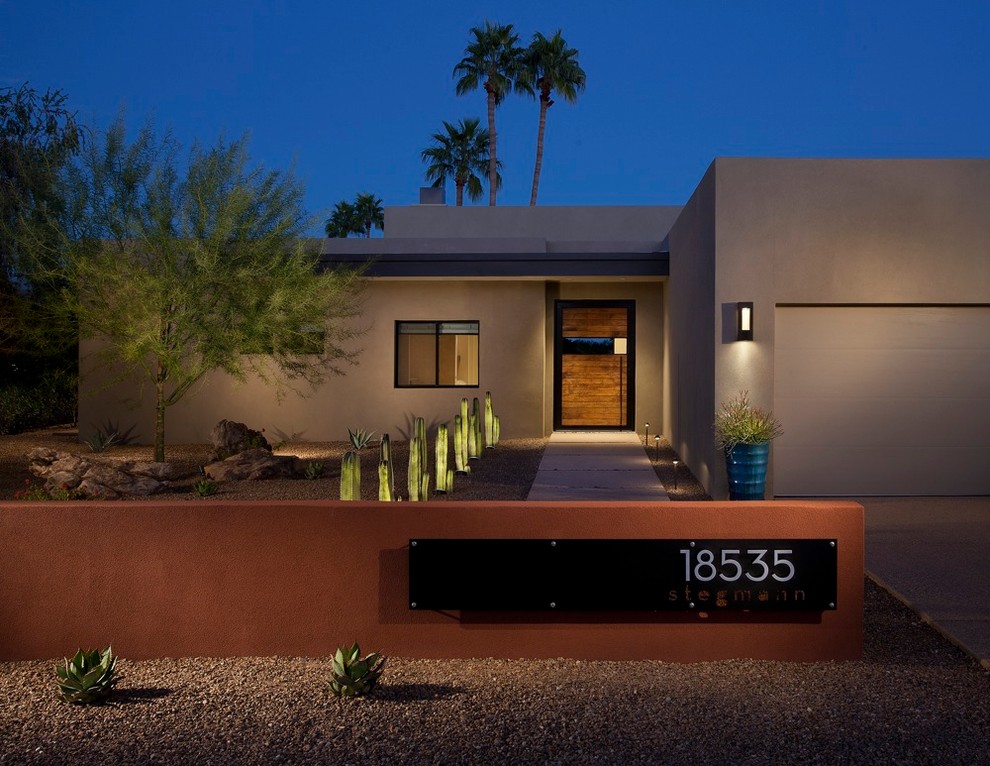 Contemporary one-storey brown exterior in Phoenix.