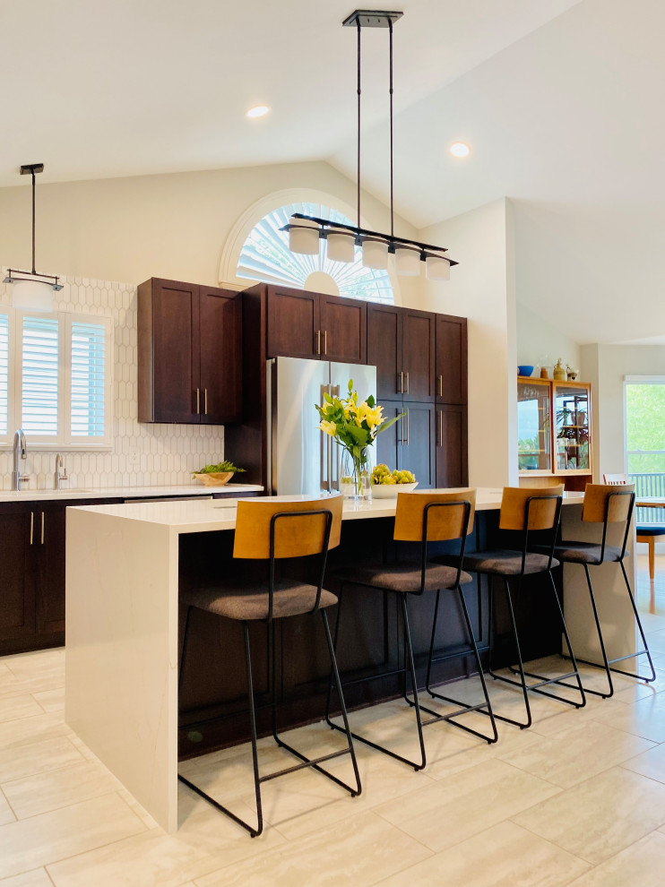Inspiration for a large midcentury kitchen in St Louis with an undermount sink, shaker cabinets, dark wood cabinets, quartz benchtops, yellow splashback, ceramic splashback, stainless steel appliances, ceramic floors, with island, beige floor, yellow benchtop and vaulted.