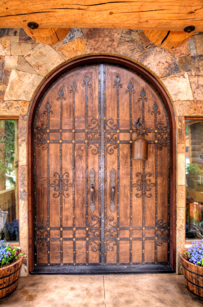 Inspiration for a rustic entryway remodel in Denver