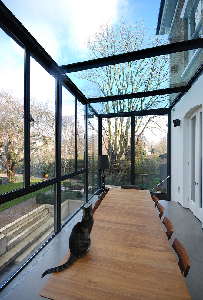 Inspiration for a large contemporary sunroom in London.