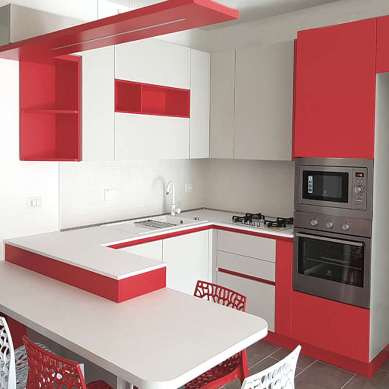 Inspiration for a mid-sized modern u-shaped eat-in kitchen in Bologna with a drop-in sink, flat-panel cabinets, red cabinets, laminate benchtops, white splashback, ceramic splashback, stainless steel appliances, porcelain floors, a peninsula, grey floor and white benchtop.