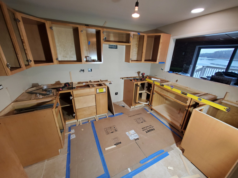 Kitchen cabinets being installed