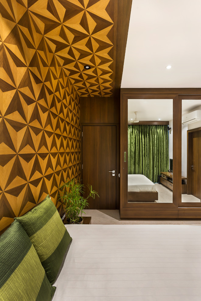 Design ideas for a contemporary bedroom in Mumbai.