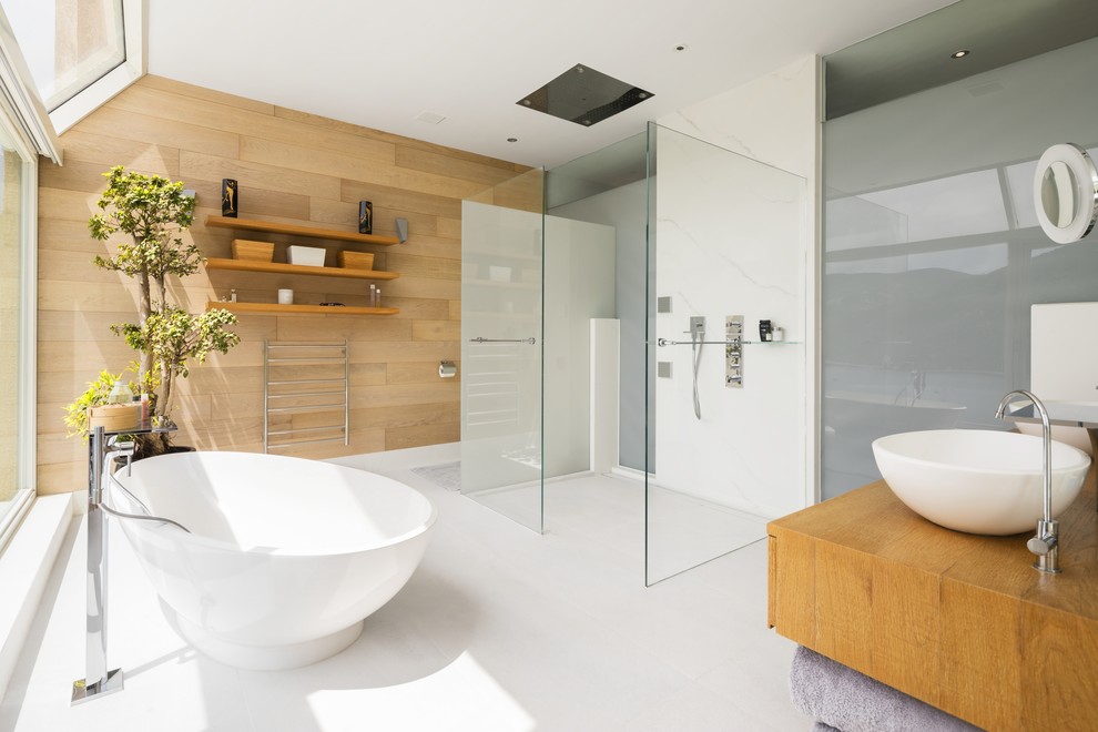 Design ideas for a contemporary bathroom in Hong Kong with a freestanding tub, white tile, stone slab, a vessel sink, wood benchtops, white floor and brown benchtops.