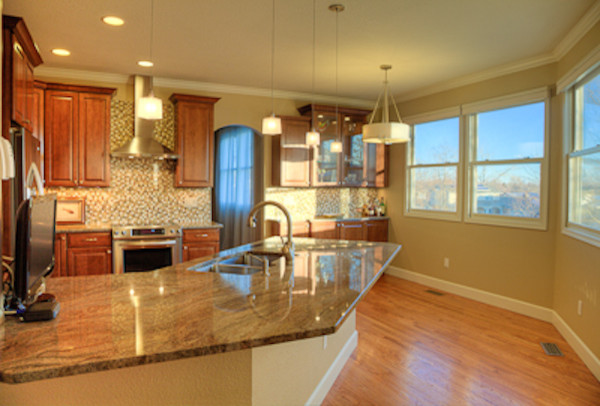 Example of a transitional kitchen design in Denver