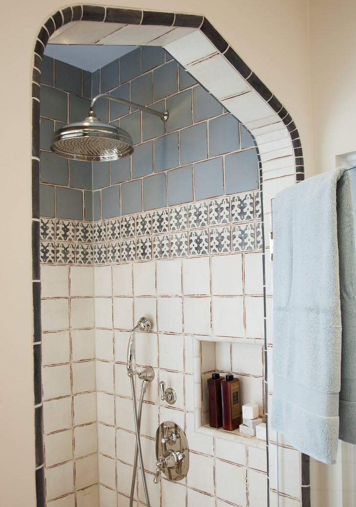 Design ideas for a mid-sized mediterranean master bathroom in San Francisco with an undermount sink, shaker cabinets, dark wood cabinets, marble benchtops, a one-piece toilet, gray tile, ceramic tile, beige walls and ceramic floors.