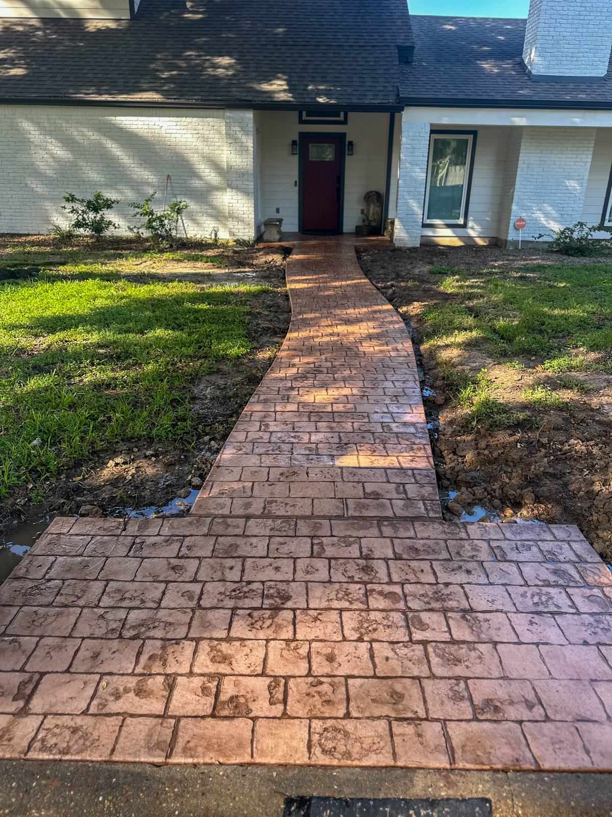 Front and backyard Stamped concrete patio in Nottingham!