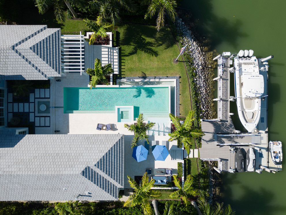 Example of a beach style pool design in Miami