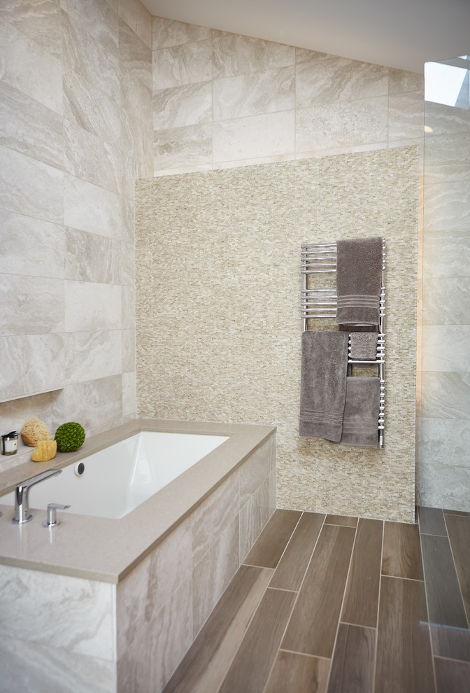 Design ideas for a mid-sized contemporary master bathroom in Detroit with an undermount tub, brown floor, beige tile, white tile, vinyl floors and white walls.