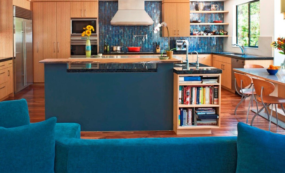 Example of a mid-sized transitional u-shaped dark wood floor eat-in kitchen design in Orange County with flat-panel cabinets, medium tone wood cabinets, blue backsplash, stainless steel appliances and an island
