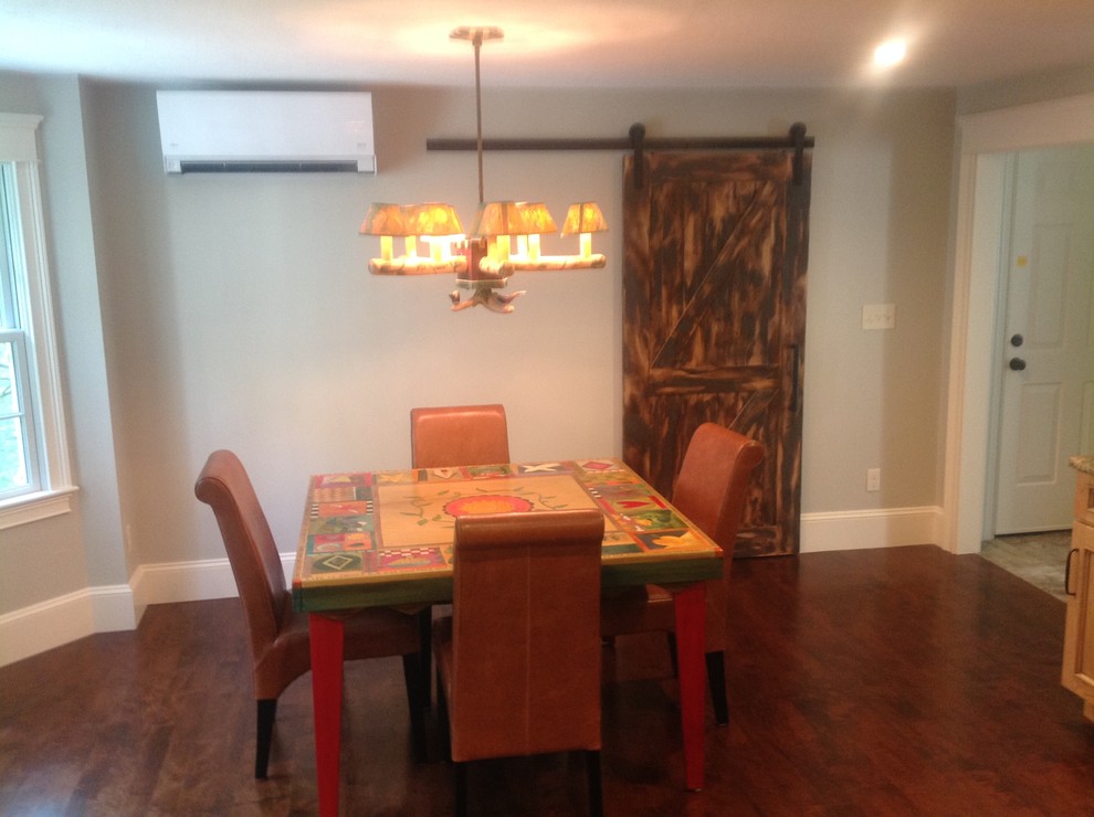 Dining room - rustic dining room idea with granite countertops