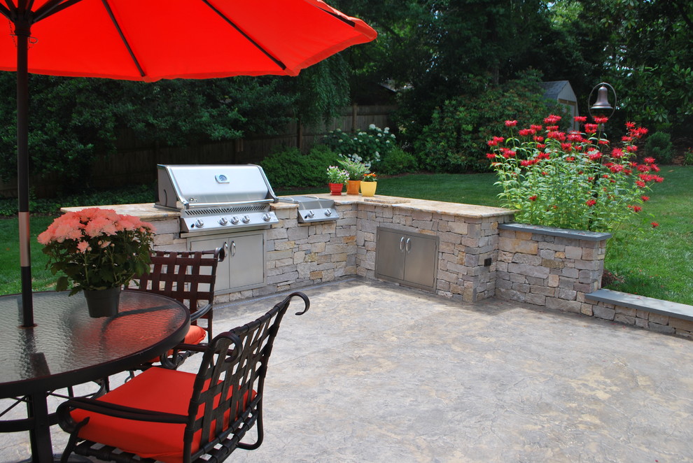 Design ideas for a contemporary backyard patio in Other with an outdoor kitchen.