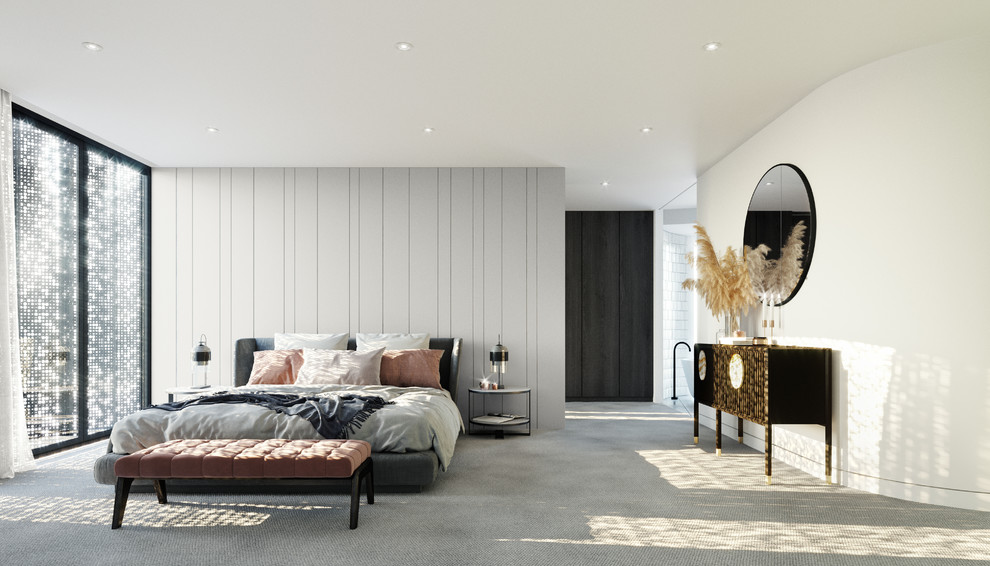 This is an example of a large contemporary master bedroom in Melbourne with white walls, carpet and grey floor.
