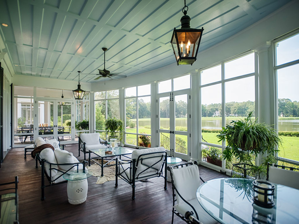 Photo of a traditional sunroom in Atlanta with dark hardwood floors and a standard ceiling.