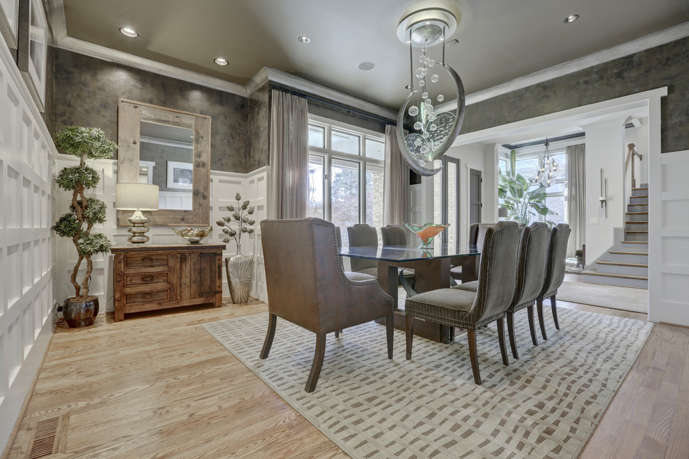 Inspiration for a large transitional separate dining room in Atlanta with grey walls, light hardwood floors, brown floor and no fireplace.