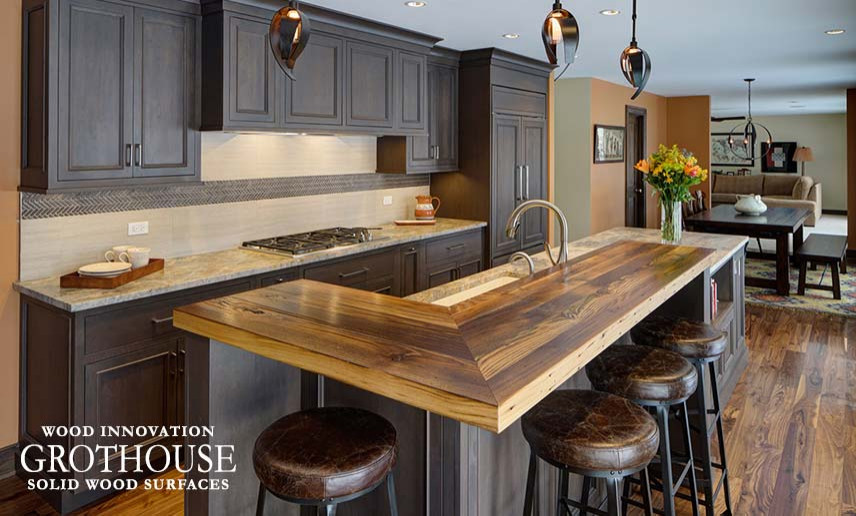 Traditional home bar in Boise with wood benchtops.