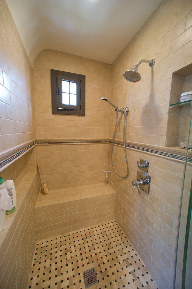 Bathroom - mid-sized traditional beige tile and cement tile ceramic tile bathroom idea in Milwaukee with a drop-in sink, beaded inset cabinets, dark wood cabinets, granite countertops, a two-piece toilet and brown walls