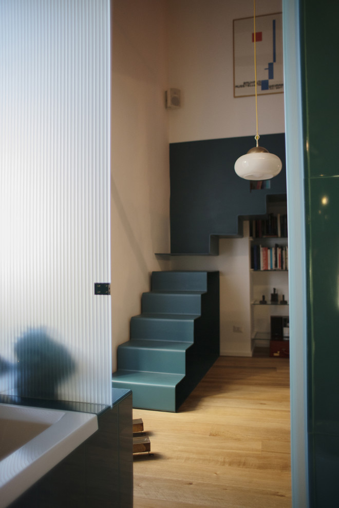 This is an example of a mid-sized eclectic staircase in Naples.