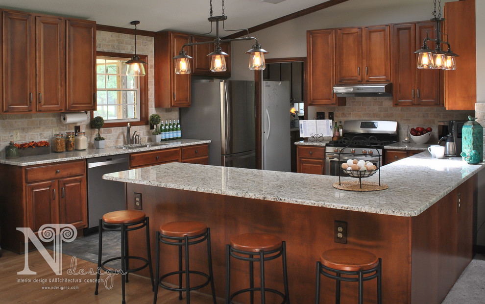 Photo of a mid-sized country u-shaped eat-in kitchen in Raleigh with an undermount sink, recessed-panel cabinets, medium wood cabinets, granite benchtops, beige splashback, stone tile splashback, stainless steel appliances, linoleum floors and with island.