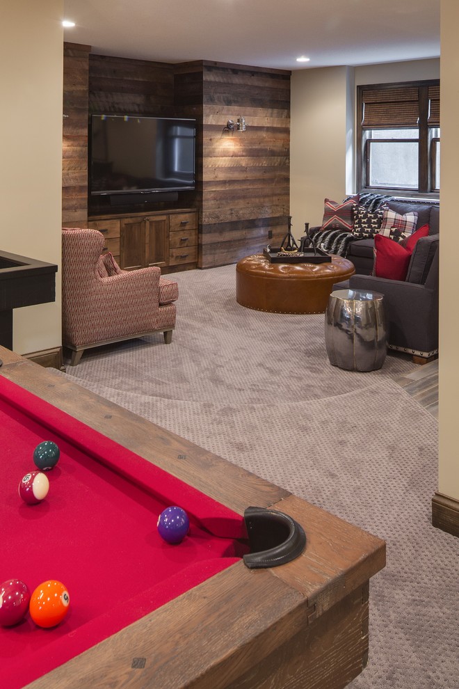 Expansive transitional open concept family room in Minneapolis with a game room, beige walls, carpet and a wall-mounted tv.