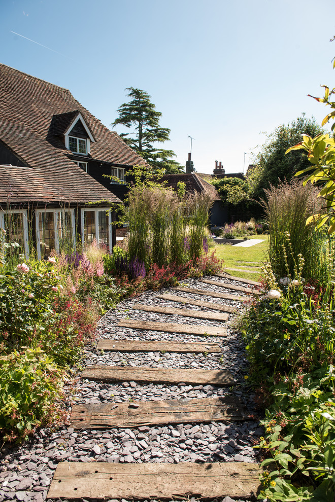 This is an example of a traditional garden in Sussex with a garden path.