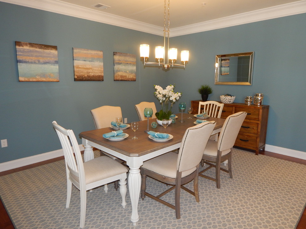Photo of a beach style dining room in New York.