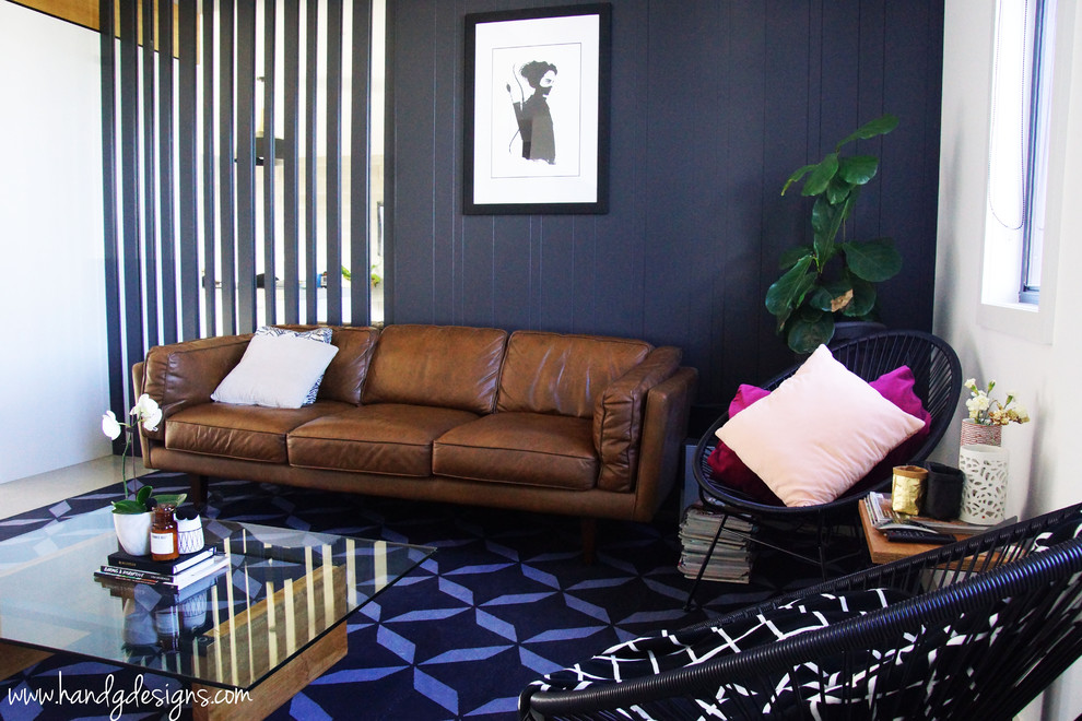 Design ideas for a mid-sized modern open concept living room in Sunshine Coast with black walls and ceramic floors.