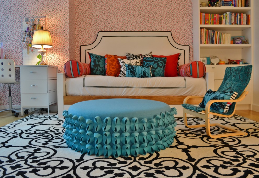 Inspiration for a contemporary kids' room for girls in New York with light hardwood floors.