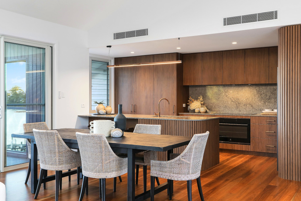 This is an example of a contemporary dining room in Wollongong.