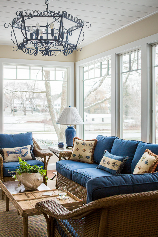 Photo of a beach style sunroom in Portland Maine with a standard ceiling.